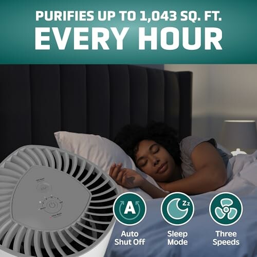 Person sleeping next to an air purifier with features highlighted.