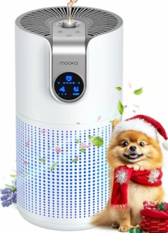 Air purifier with a small dog wearing a Santa hat and scarf.