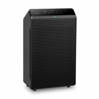 Black air purifier with control panel on top.