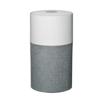 Modern cylindrical air purifier with fabric cover